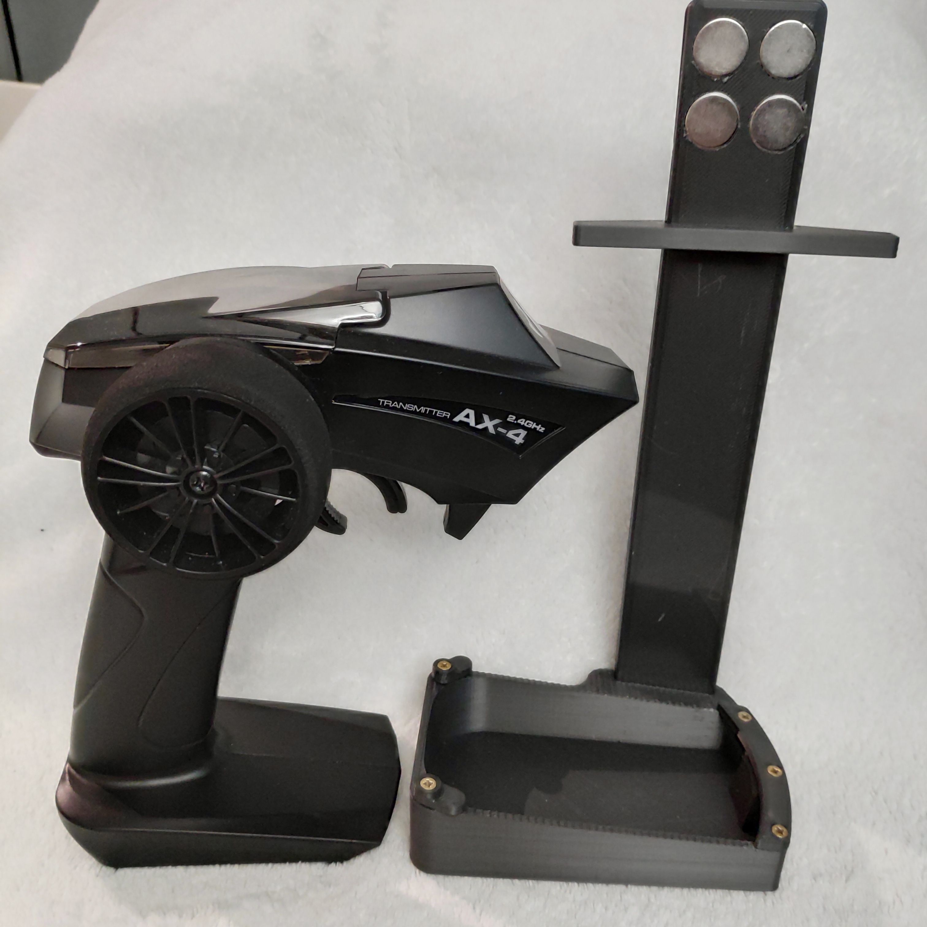 STL file Axial SCX24 trnasmitter phone holder (side) for video