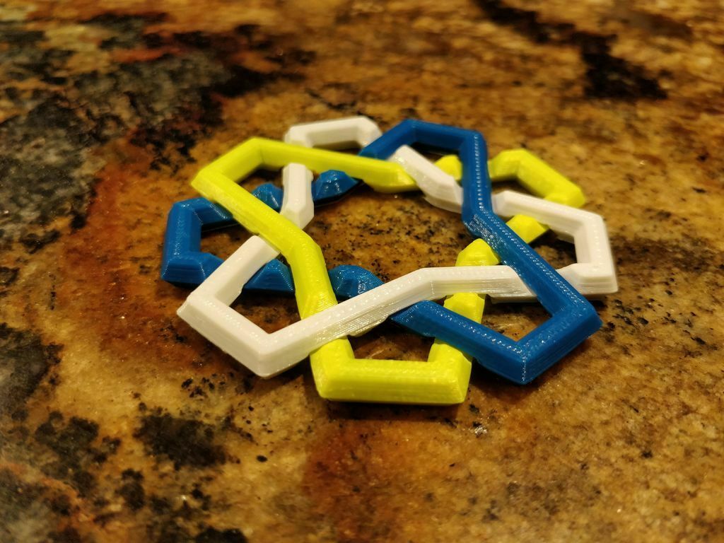 Free 3D file Multi-Material Interlocking Rings Puzzle・Design to ...