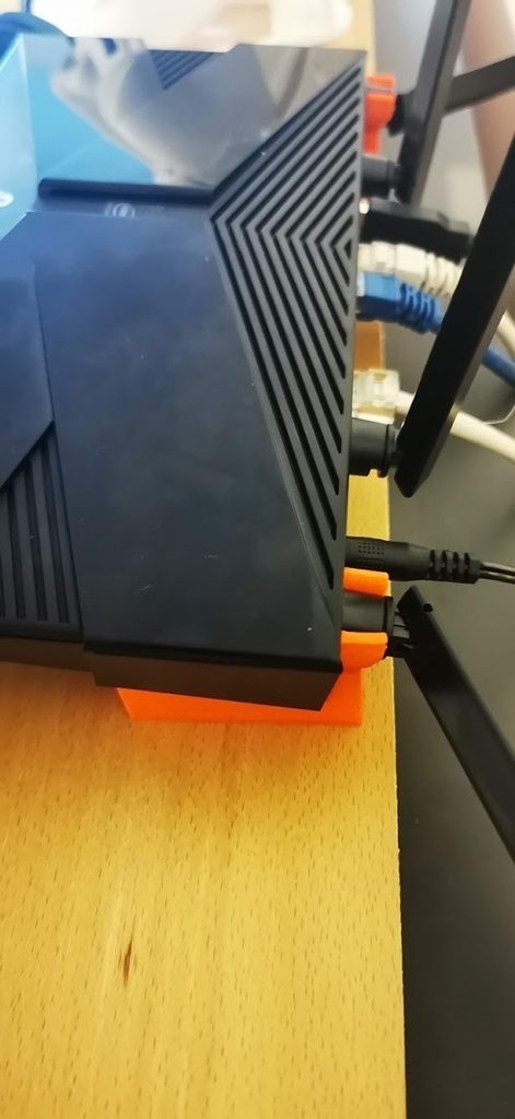 Free STL file TP-Link Archer AX50 router stand/Legs・3D printable design ...