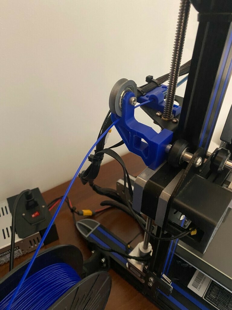 Free 3D file Ender 3 X-axis filament roller bracket extended with cable ...