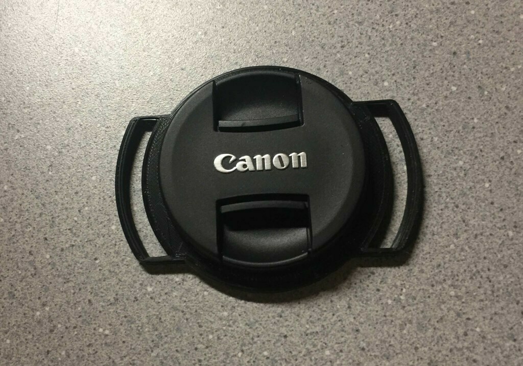 Free 3D file 58mm Strap Mount Lens Cap Holder・3D printing template to