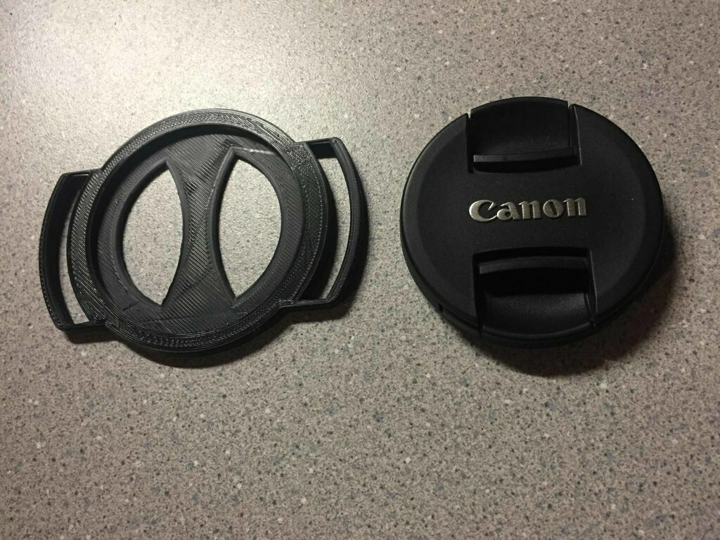 Free 3D file 58mm Strap Mount Lens Cap Holder・3D printing template to